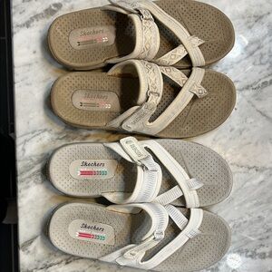 Skechers Tan and White Slip-On Sandals.  Both pair.